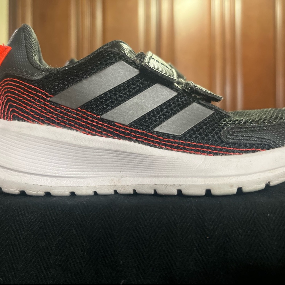 adidas Black and Red Sneakers with Breathable Mesh and Cushioned Midsole
